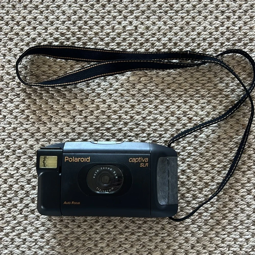 Polaroid 95 film camera captiva auto focus SLR